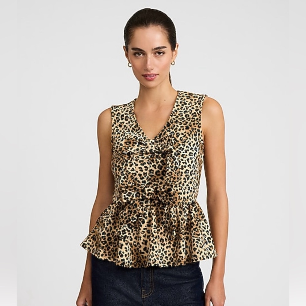 NWT, Express Animal Print V-Neck Peplum Blouse. Size Large. Perfect Condition.